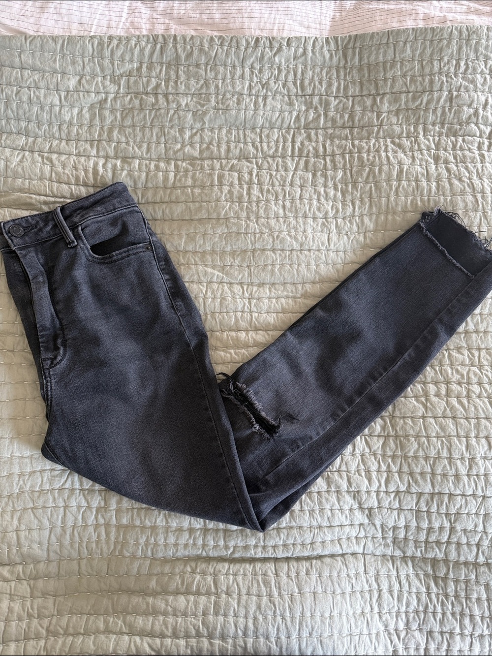 High-Rise Black Skinny Jeans with Raw Hem